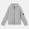 Kapuzenpullover mit Reißverschluss, Taschen und Fischerrippenmuster.