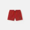 Schmal geschnittene Badeshorts mit Taschen und Mesh-Futter