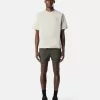 Schmal geschnittene Badeshorts mit Taschen und Mesh-Futter