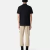 Schmal geschnittenes Kurzarm-Poloshirt mit Compass-Aufnäher Schmal geschnittenes Kurzarm-Poloshirt mit Compass-Aufnäher